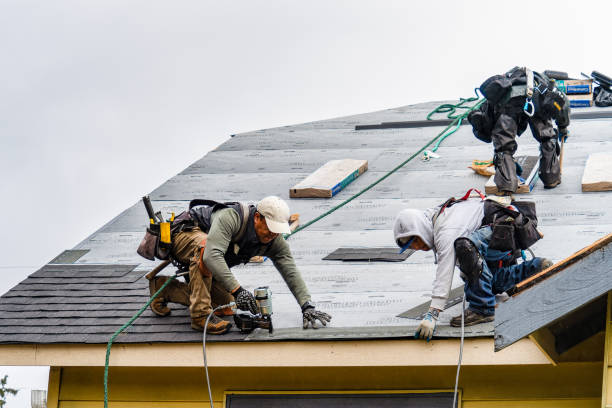 Professional Gutter Installation technician working in Centerville, WA